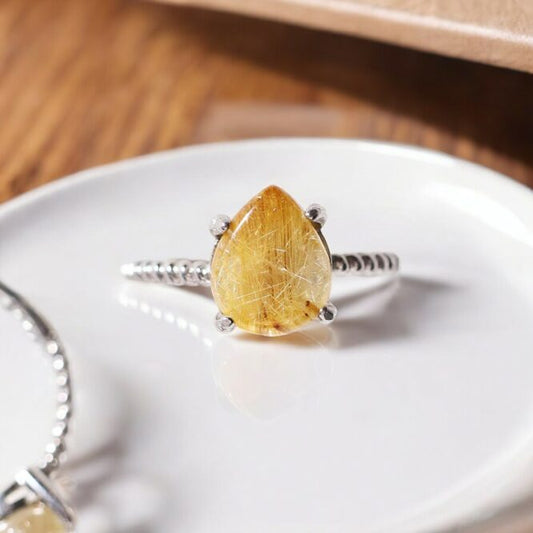 Golden Rutile In Silver Ring Drop Shape