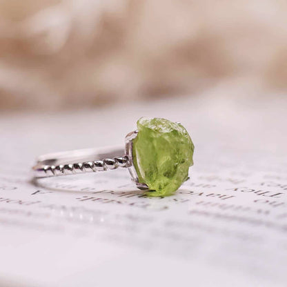 Peridot Raw In Silver Ring